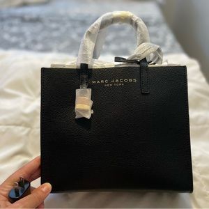 Small, black leather Marc Jacobs tote.